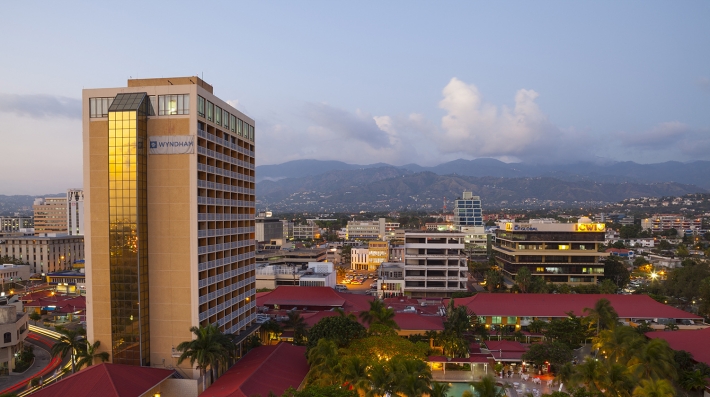 A view of a city surrounded by mountains