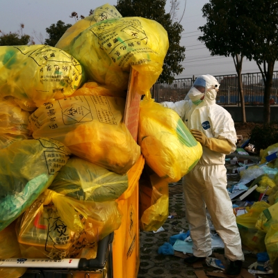 Man cleaning up trash