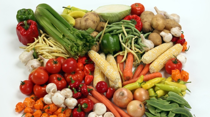 Assorted vegetables displayed on a surface